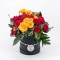 Black box of colourful roses